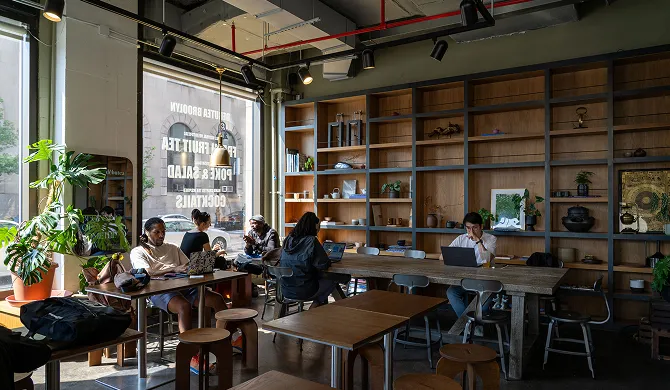 Boutique coffee shop with seatings at Fort Greene neighborhood near Eighty Nine DeKalb luxury apartment.